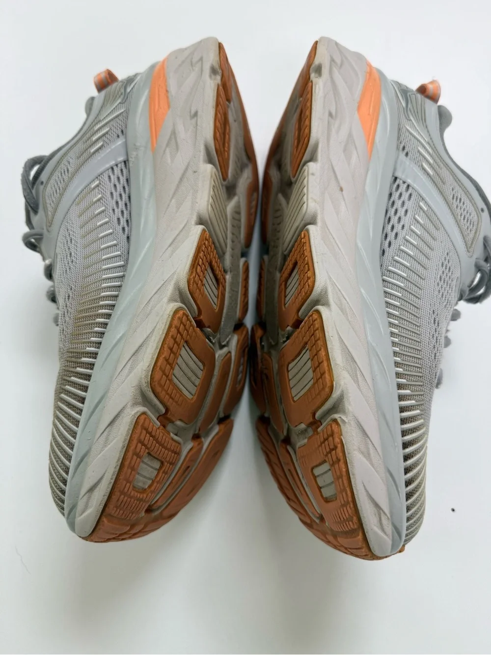 Hoka One One Men's Light Gray Running Shoes with Orange Accents